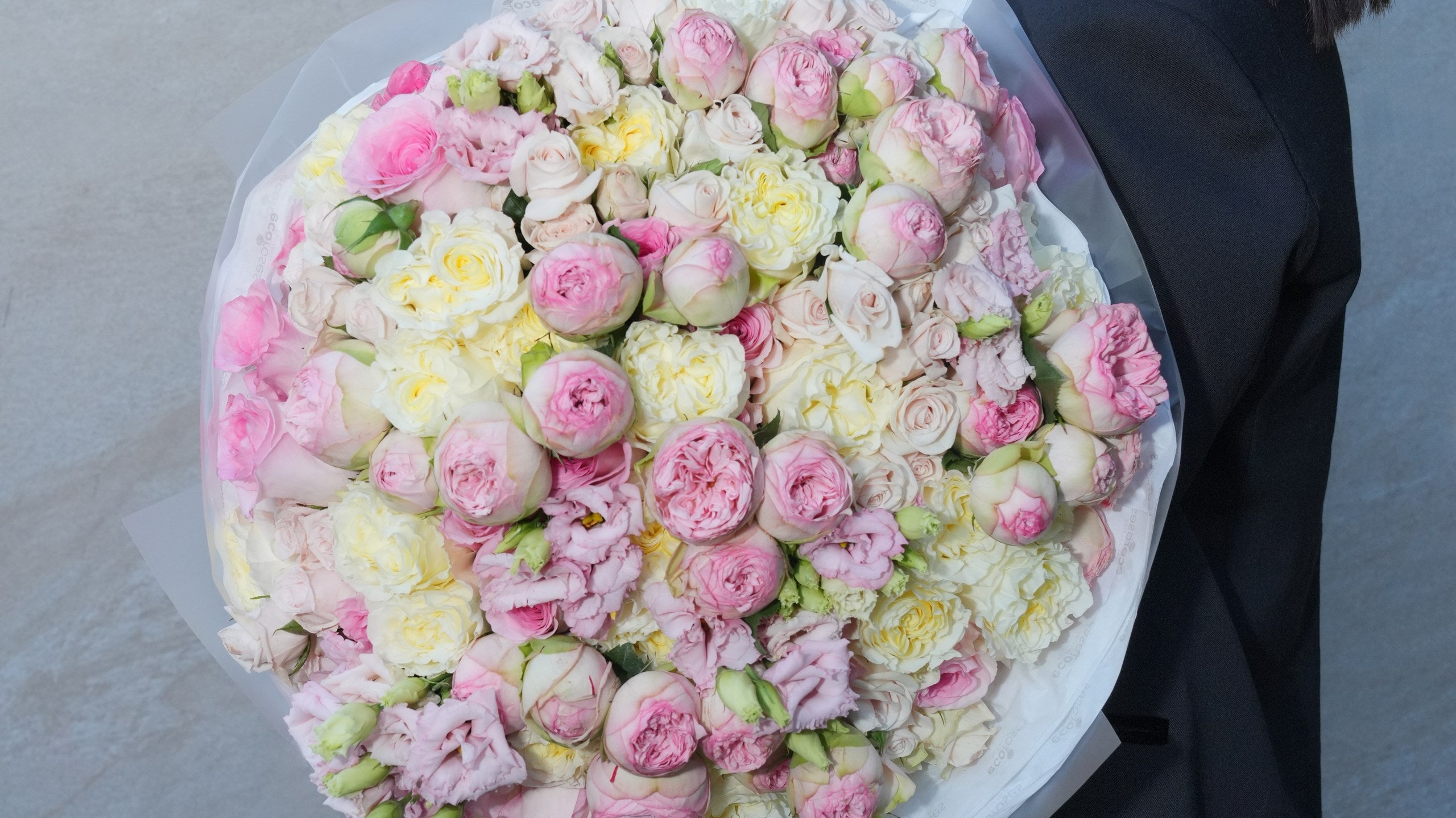 Bright celebratory congratulations rose bouquet hand-tied by Ecoroses, a Los Angeles florist