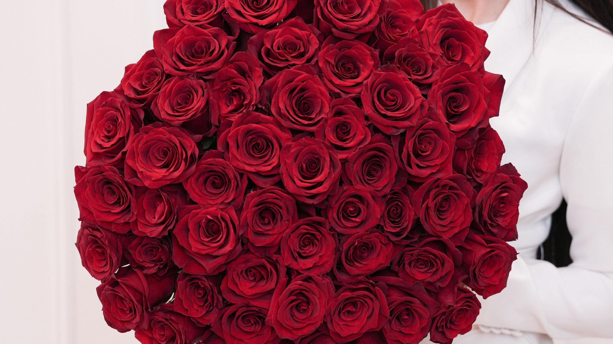 Luxury red rose bouquet hand-tied by Ecoroses, a boutique florist in Los Angeles