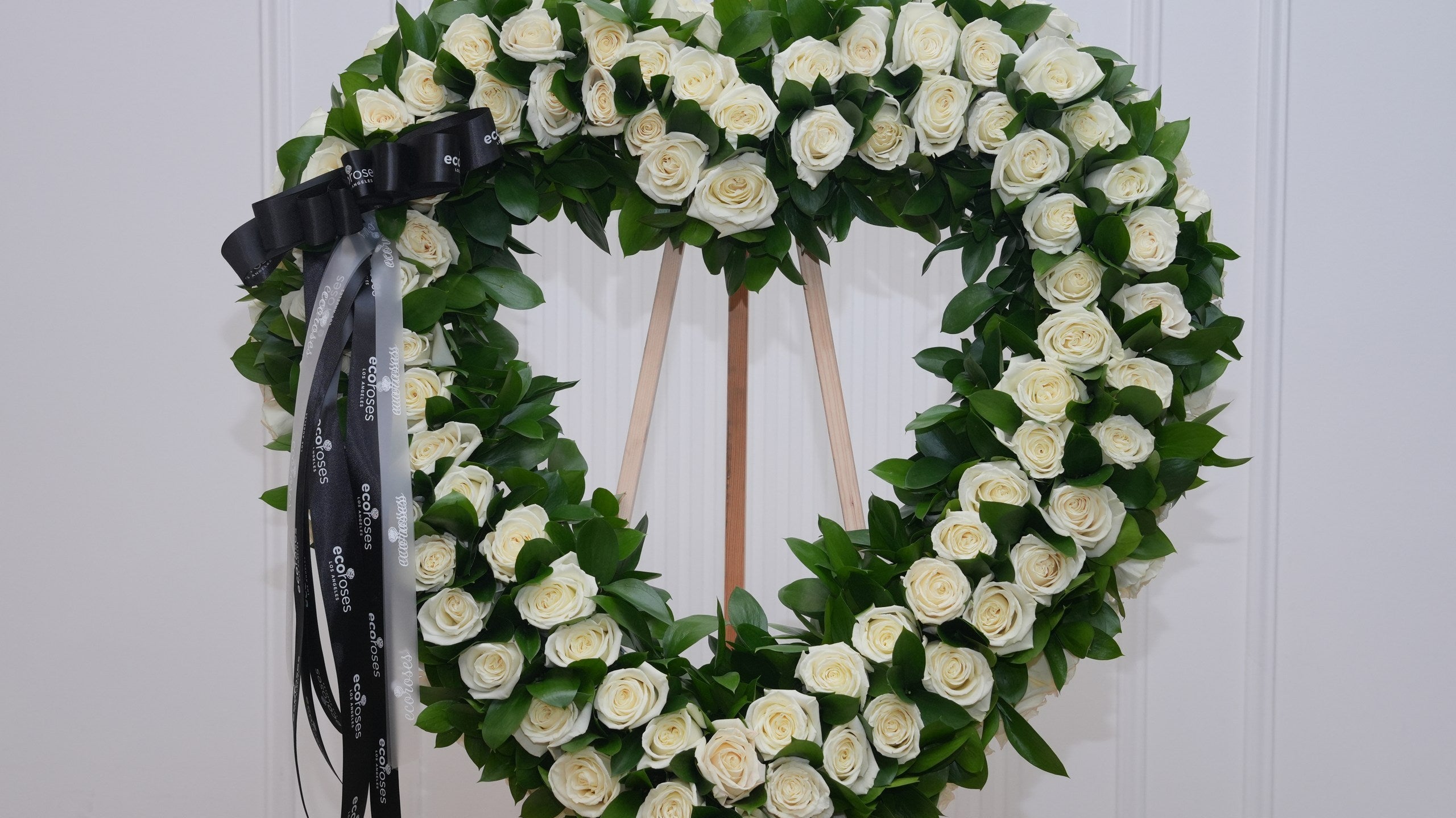 White and cream sympathy rose bouquet hand-tied by Ecoroses, a Los Angeles florist