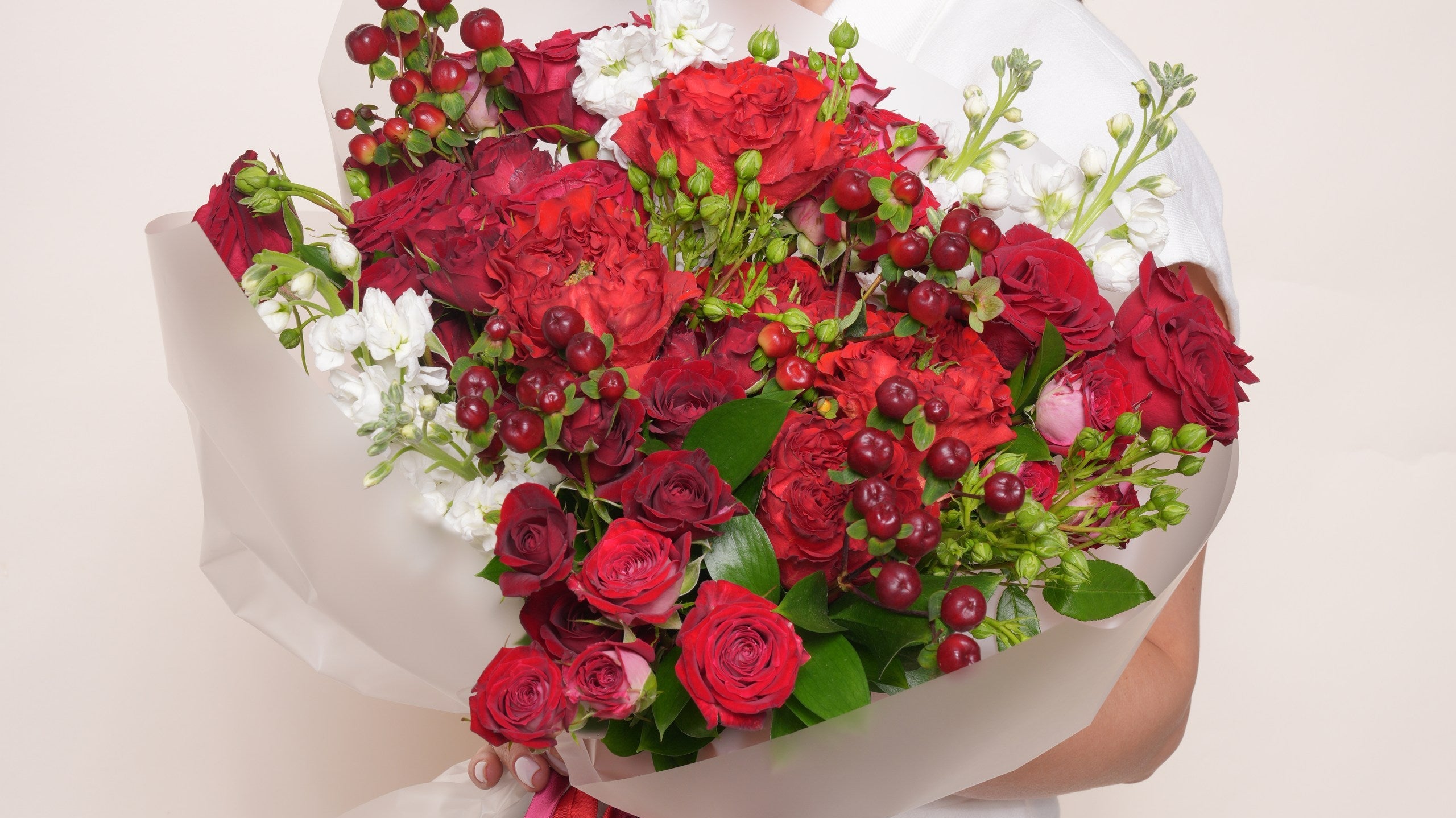 Burgundy and terracotta autumn bridal bouquet hand-tied by Ecoroses, a Los Angeles wedding florist