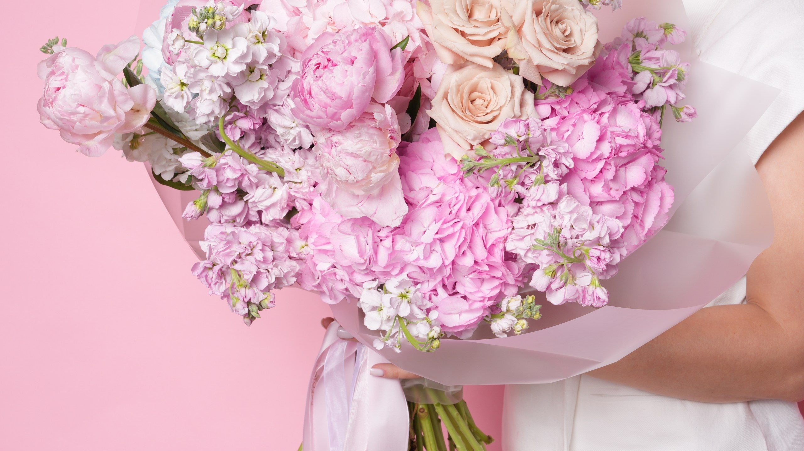 Cream and blush housewarming rose bouquet hand-tied by Ecoroses, a Los Angeles florist