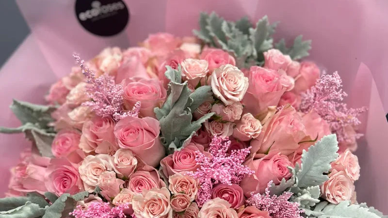 Deluxe Bouquet with 25 Luciano Roses, spray roses & fillers - paper wrapped Glendale Florists