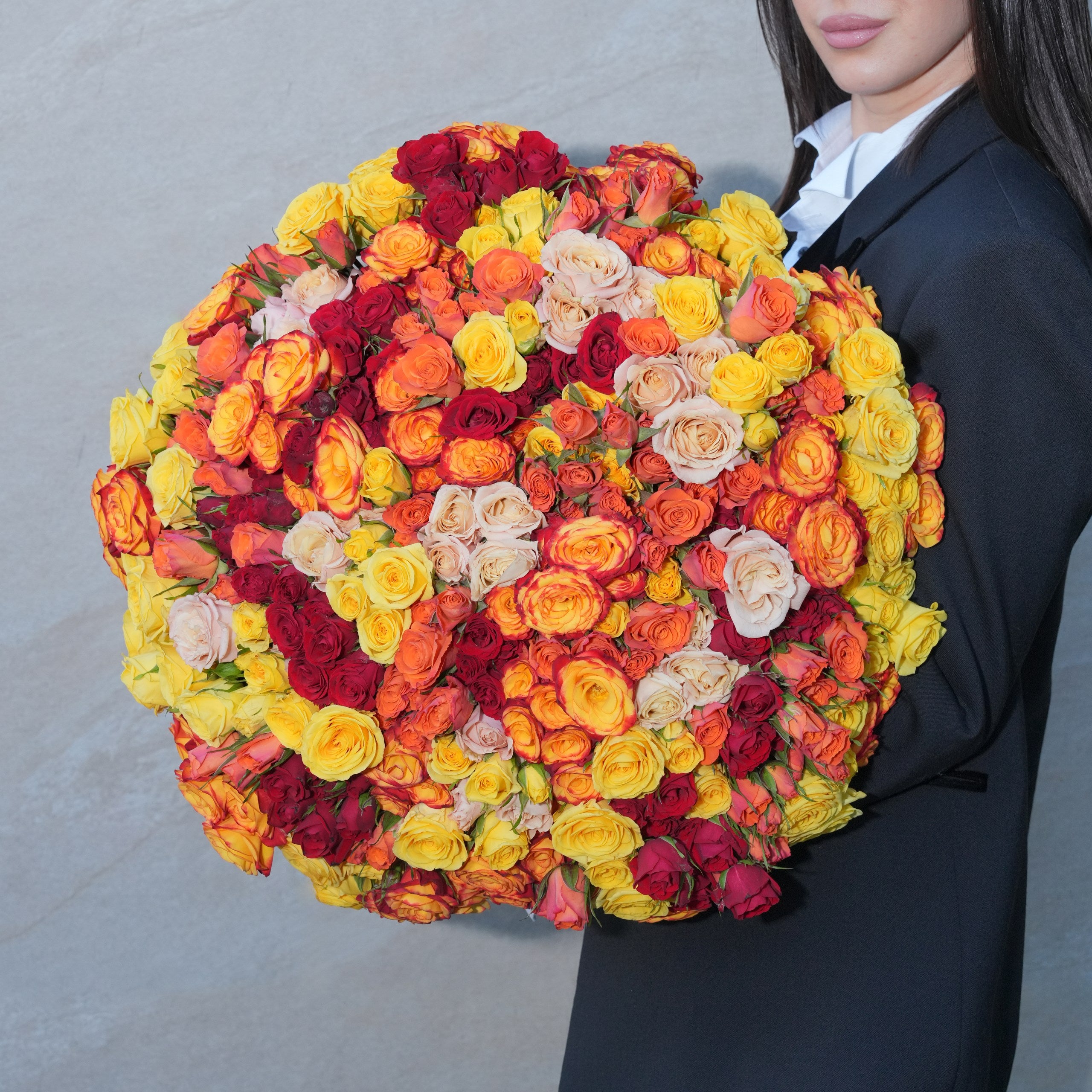 Fiammetta luxury bouquet — star baby roses in yellow, orange, sahara, and hot pink hand-tied sunset arrangement | Ecoroses Los Angeles
