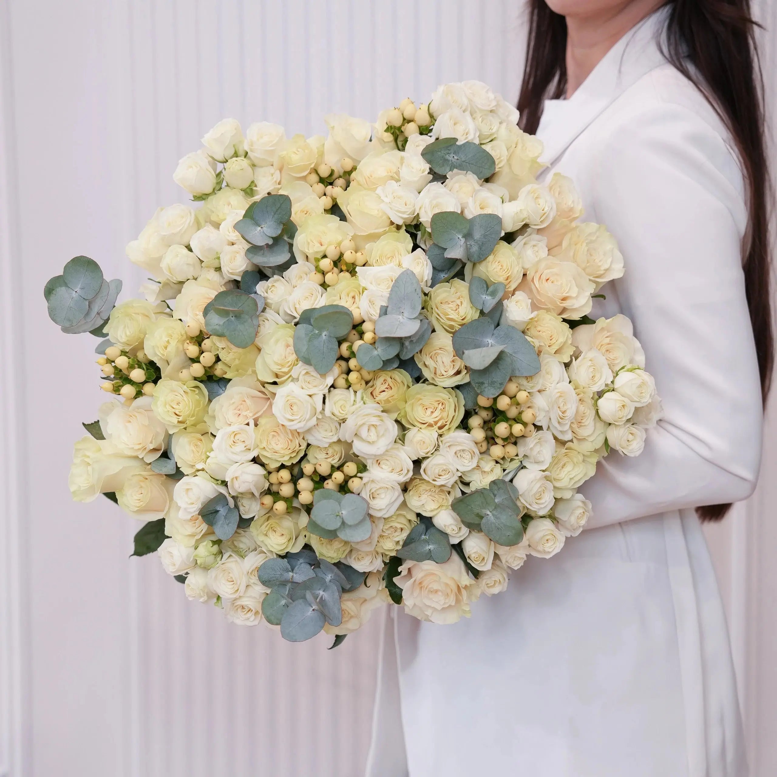 Bianca — ivory roses & lisianthus bouquet, hand-tied by Ecoroses | flower delivery Los Angeles