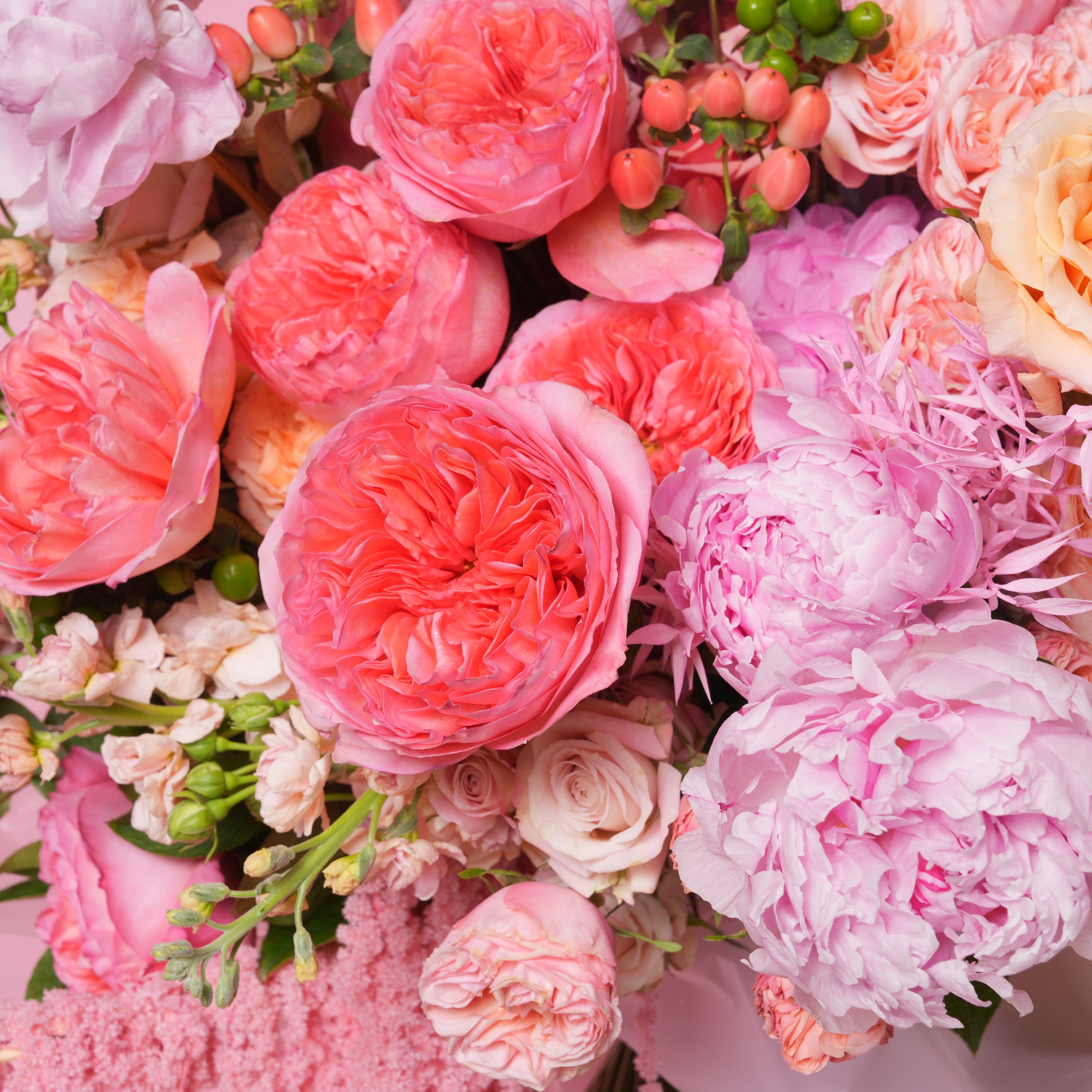 Coralia couture bouquet — full-scale coral and peach arrangement with cascading preserved amaranthus | Ecoroses Los Angeles