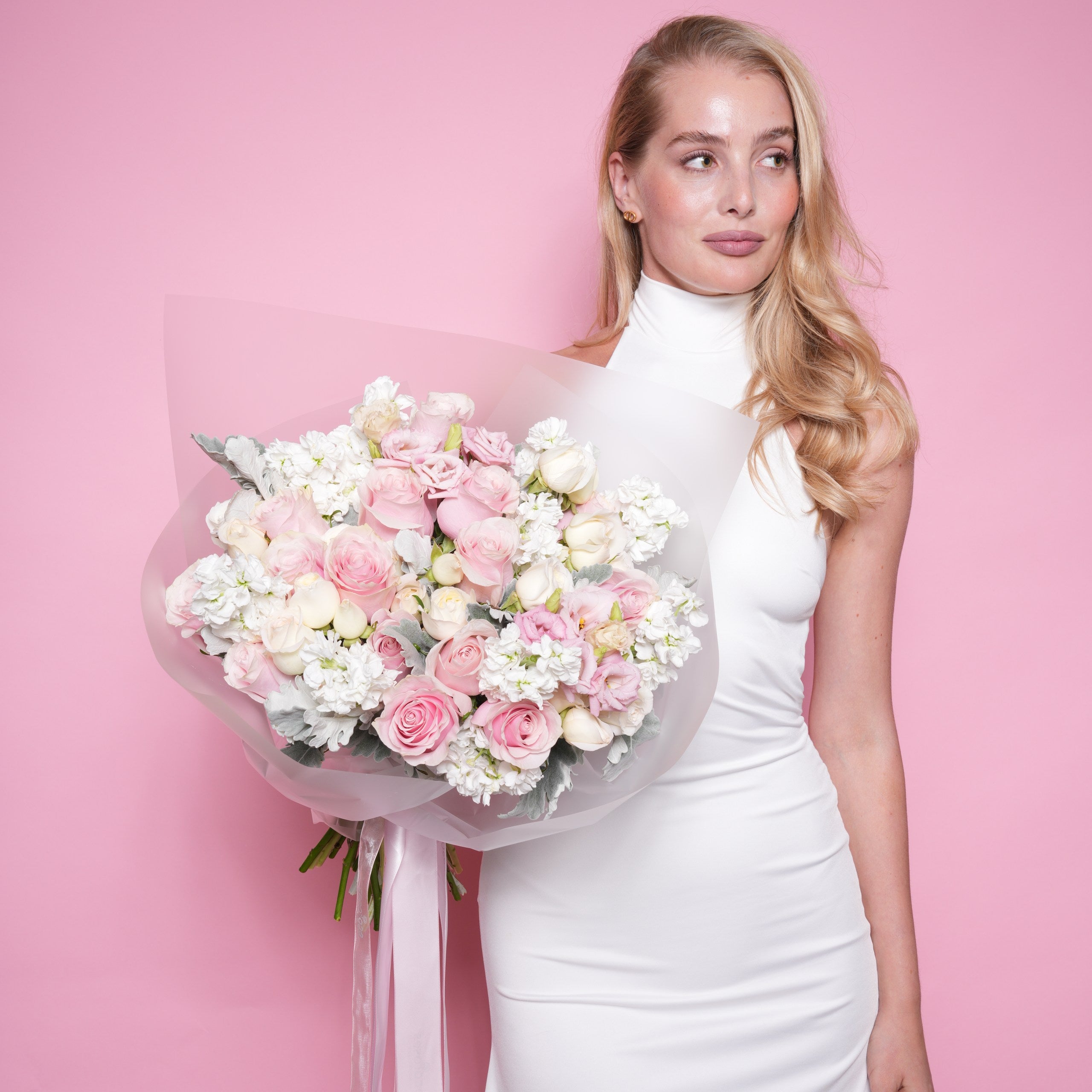 Nerina couture bouquet — detail of cream roses and white stock with silver dusty miller | Ecoroses Los Angeles