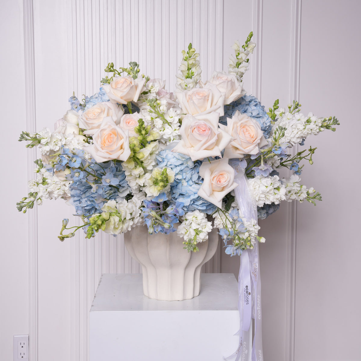 Bruna couture arrangement — detail of blue hydrangea with white garden roses and delphinium | Ecoroses Los Angeles