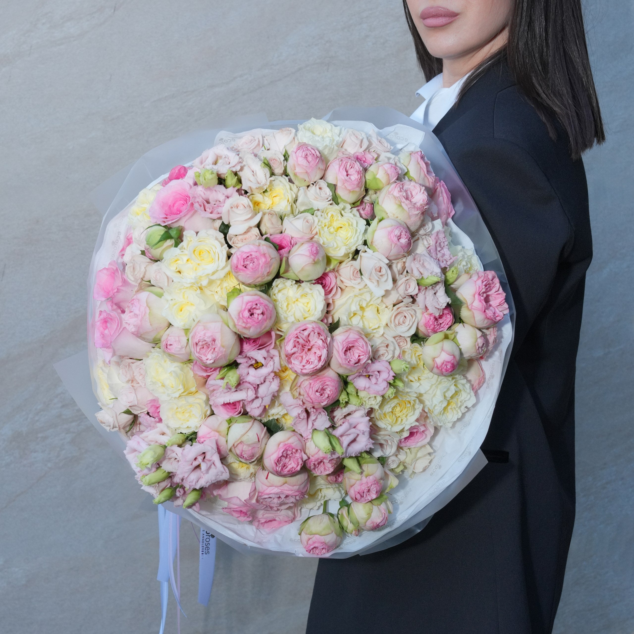 Bright celebratory congratulations rose bouquet hand-tied by Ecoroses, a Los Angeles florist