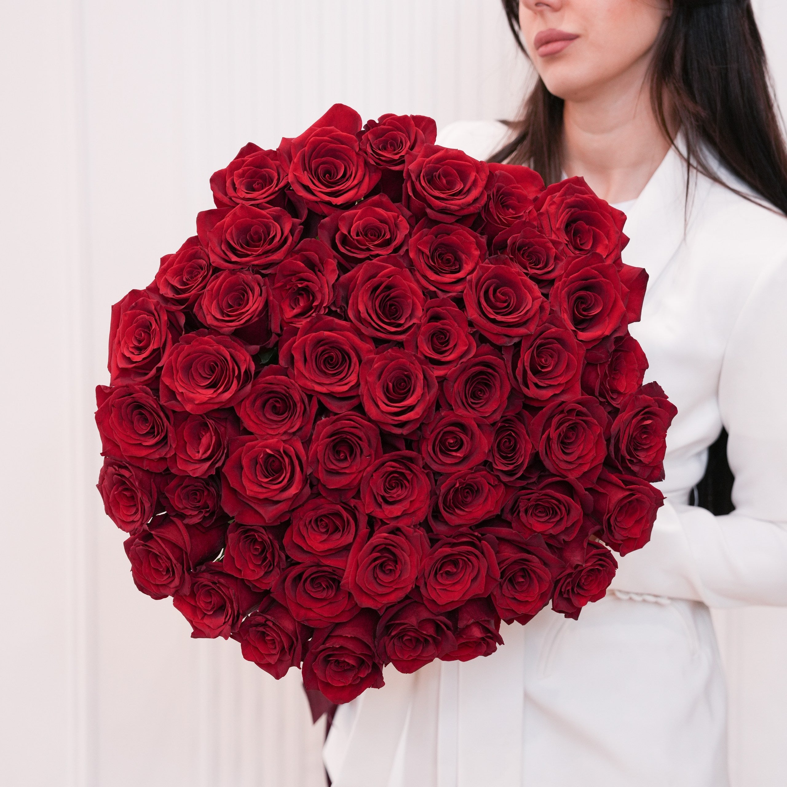 Luxury red rose bouquet hand-tied by Ecoroses, a boutique florist in Los Angeles