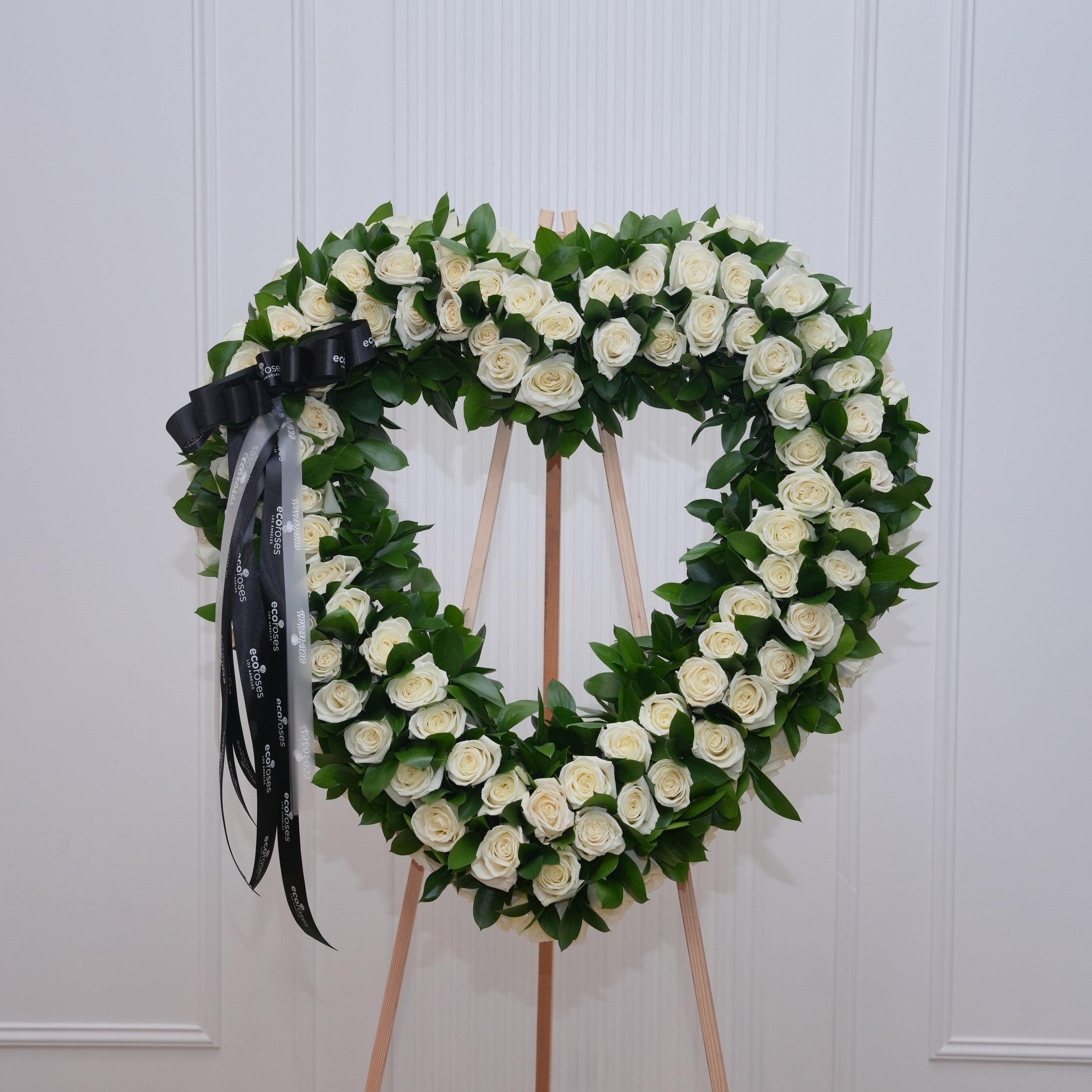 White and cream sympathy rose bouquet hand-tied by Ecoroses, a Los Angeles florist