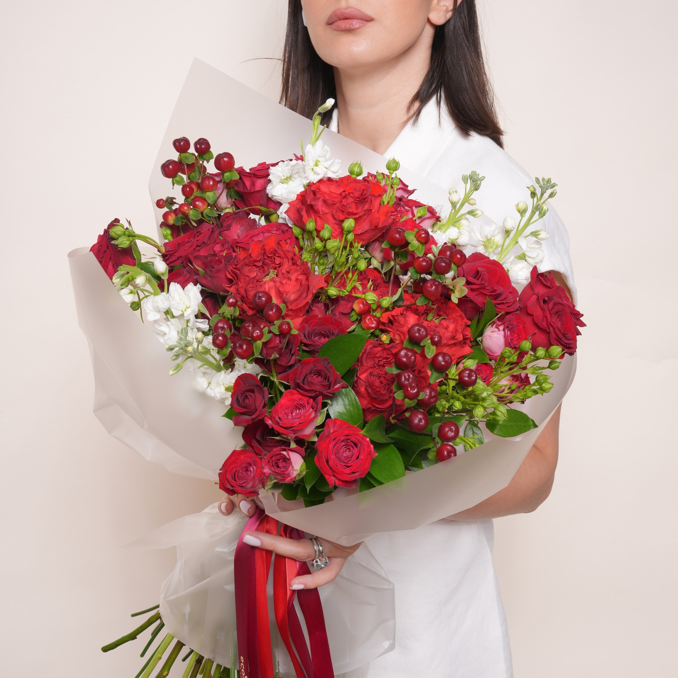 Burgundy and terracotta autumn bridal bouquet hand-tied by Ecoroses, a Los Angeles wedding florist