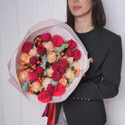 Veluria luxury bouquet — Princess Crown roses, Red Piano, eucalyptus, and coffee bean foliage in a moody blush-and-crimson hand-tied arrangement | Ecoroses Los Angeles
