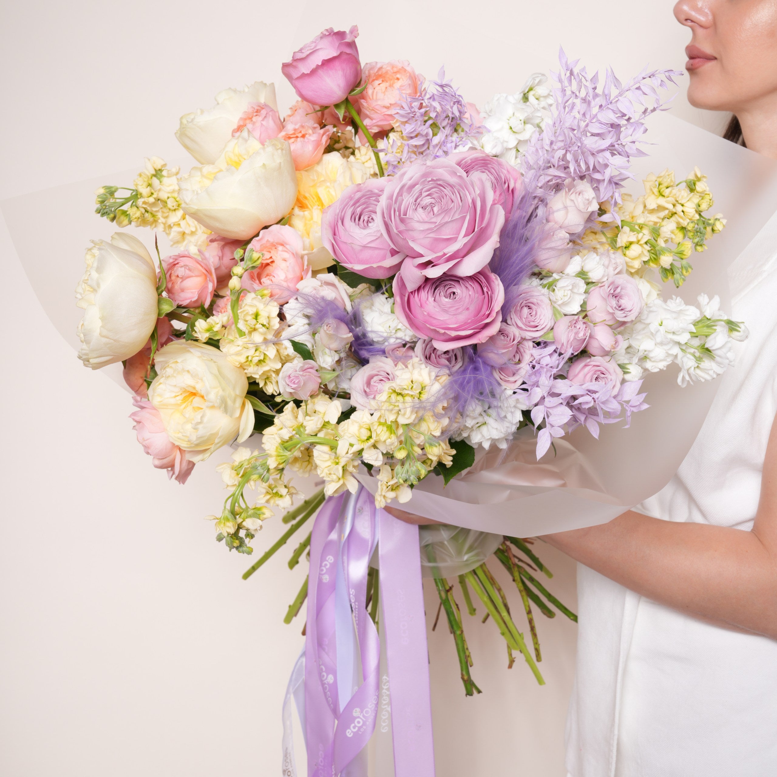 Aurinda luxury bouquet — detail of gold and blush garden roses against soft purple stock | Ecoroses Los Angeles