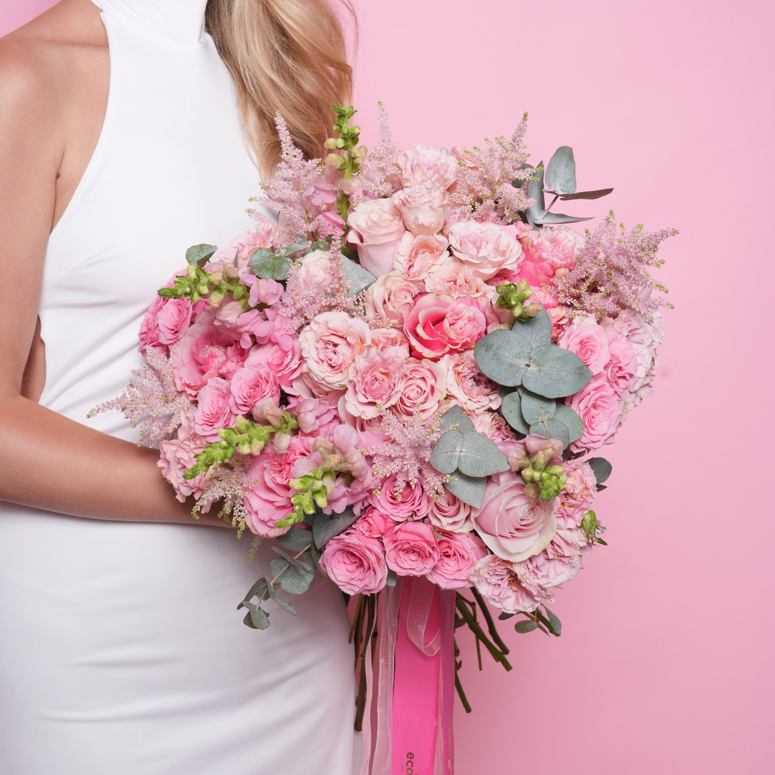 Rosalba couture bouquet — Pink Mondial roses with pink baby roses, astilbe, and snapdragon in a soft textural hand-tied arrangement | Ecoroses Los Angeles