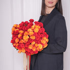 Junia bouquet — two bunches of coral and yellow baby roses, hand-tied | Ecoroses Los Angeles