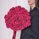Cornelia bouquet — two bunches of hot pink baby roses in vivid fuchsia, hand-tied | Ecoroses Los Angeles