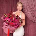 Morgana luxury bouquet — burgundy and raspberry baby roses, burgundy snapdragons, amaranth and copper beech in a hand-tied arrangement | Ecoroses Los Angeles
