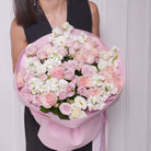 Candida bouquet — pink Mondial roses with lavender roses, stock, and lisianthus, hand-tied | Ecoroses Los Angeles