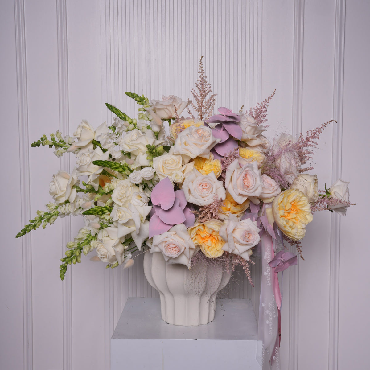 Renata couture arrangement — Ohara, Playa Blanca, and cream garden roses with pink astilbe, lisianthus, and snapdragon in a glass vase | Ecoroses Los Angeles